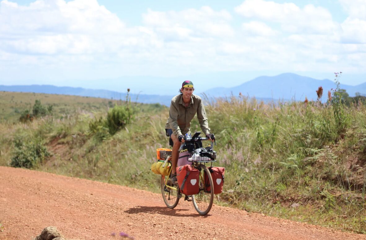 Ian Andersen cycling through Malawi in 2023.